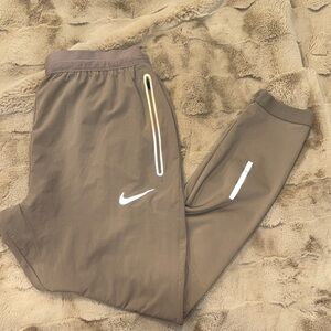 Nike Taupe Joggers with Reflective Details